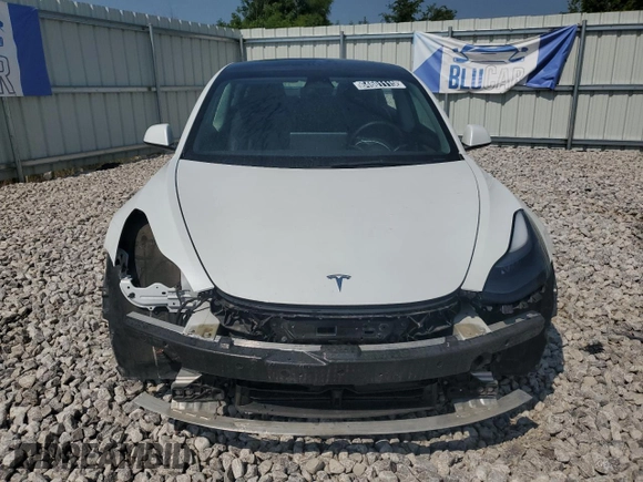 2023 Tesla Model 3 with VIN 5YJ3E1EA8PF449797, listed as a Copart auction lot 64601115 with 99,771 mi miles and Clean title. Bid and sale history available at DreamBid. Image 5.