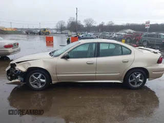 2003 Pontiac Grand Am SE1 with VIN 1G2NF52E03C327760, listed as a IAAI auction lot 41718054 with 156,173 mi miles. Bid and sale history available at carsss.com. Image 15.