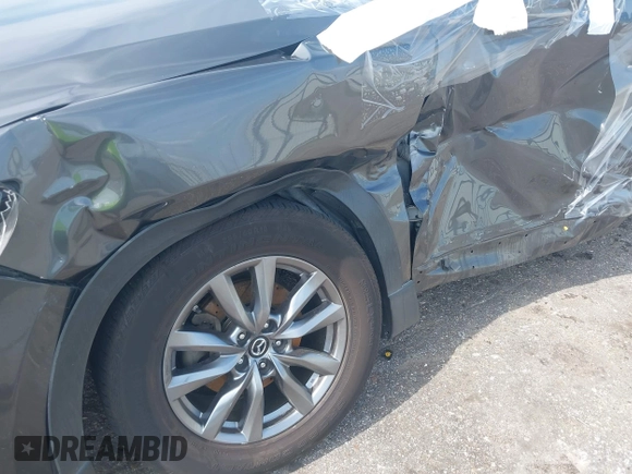 2019 Mazda CX-9 Sport with VIN JM3TCABY0K0327361, listed as a IAAI auction lot 42362232 with 264,699 mi miles and . Bid and sale history available at DreamBid. Image 6.