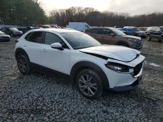 2021 Mazda CX-30 Preferred z VIN 3MVDMBCLXMM222277, wystawiony jako Copart lot #82465924 z przebiegiem 90 863 mil mil oraz Szkoda całkowita • Salvage title. Historia ofert i sprzedaży dostępna na DreamBid. Obrazek 4.
