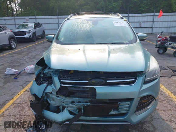 2013 Ford Escape Titanium with VIN 1FMCU9J99DUD63037, listed as a IAAI auction lot 42436605 with 168,200 mi miles and . Bid and sale history available at DreamBid. Image 12.