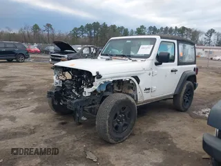 2021 Jeep Wrangler Sport S with VIN 1C4GJXAN6MW677281, listed as a IAAI auction lot 40814351 with 55,360 mi miles and . Bid and sale history available at DreamBid. Image 17.