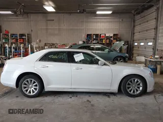 2014 Chrysler 300 with VIN 2C3CCAAGXEH217715, listed as a IAAI auction lot 41666179 with 145,744 mi miles and . Bid and sale history available at DreamBid. Image 13.