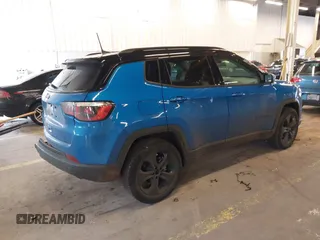 2019 Jeep Compass Latitude with VIN 3C4NJDBB7KT741048, listed as a IAAI auction lot 41597839 with 59,431 mi miles and . Bid and sale history available at DreamBid. Image 4.