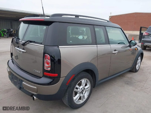 2013 MINI Cooper Clubman with VIN WMWZF3C51DT489508, listed as a IAAI auction lot 41748025 with 65,305 mi miles. Bid and sale history available at carsss.com. Image 4.