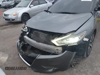 2016 Nissan Maxima SL with VIN 1N4AA6AP0GC424793, listed as a IAAI auction lot 40922109 with 135,974 mi miles and . Bid and sale history available at DreamBid. Image 6.