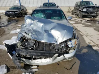 2002 Mazda Millenia z VIN JM1TA221921738582, wystawiony jako Copart lot #88500905 z przebiegiem 182 323 mil mil oraz Szkody całkowita. Historia ofert i sprzedaży dostępna na DreamBid. Obrazek 5.