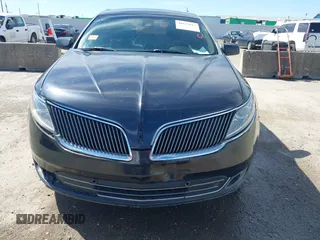 2014 Lincoln MKS with VIN 1LNHL9DK1EG604323, listed as a IAAI auction lot 41635817 with 223,136 mi miles. Bid and sale history available at carsss.com. Image 12.