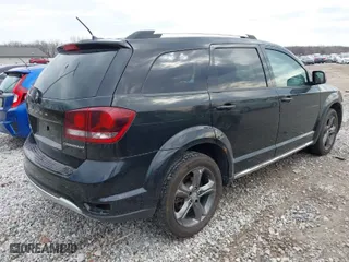 2015 Dodge Journey Crossroad with VIN 3C4PDDGGXFT639673, listed as a IAAI auction lot 41915884 with 199,654 mi miles. Bid and sale history available at carsss.com. Image 4.