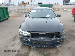 2018 BMW 3 Series 330i xDrive with VIN WBA8D9C54JEM31381, listed as a IAAI auction lot 41904785 with 64,796 mi miles and . Bid and sale history available at DreamBid. Image 12.
