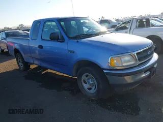1997 Ford F-150 with VIN 1FTDX1728VKB95142, listed as a IAAI auction lot 41688875 with 74,964 mi miles and . Bid and sale history available at DreamBid. Image 1.