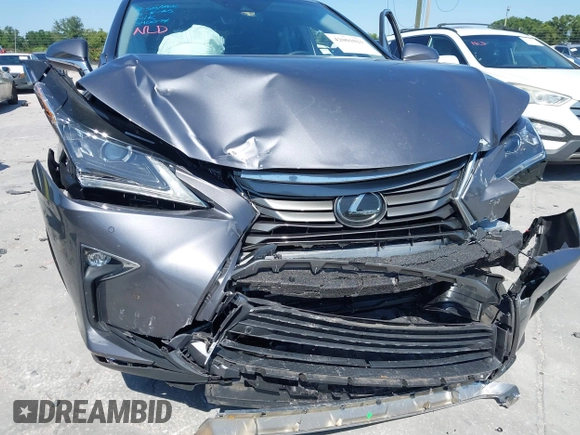 2019 Lexus RX with VIN 2T2ZZMCA0KC132043, listed as a IAAI auction lot 42001021 with 23,663 mi miles. Bid and sale history available at carsss.com. Image 6.