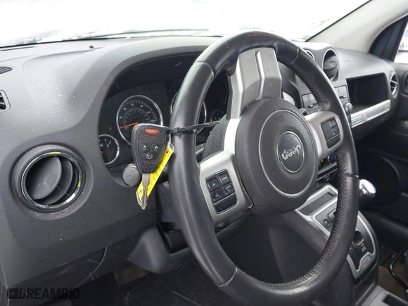 2016 Jeep Compass High Altitude Edition with VIN 1C4NJDEB8GD758174, listed as a IAAI auction lot 41235089 with 144,841 mi miles. Bid and sale history available at carsss.com. Image 11.