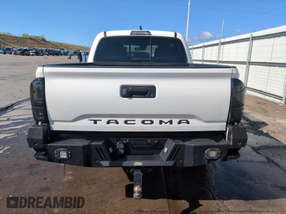 2020 Toyota Tacoma SR5 z VIN 5TFCZ5AN9LX230688, wystawiony jako Copart lot #55305165 z przebiegiem 50 381 mil mil oraz Szkoda całkowita • Salvage title. Historia ofert i sprzedaży dostępna na DreamBid. Obrazek 6.