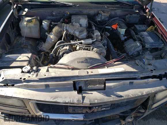 1997 GMC Suburban z VIN 3GKFK16R3VG511306, wystawiony jako Copart lot #78504814 z przebiegiem 287 079 mil mil oraz Szkoda całkowita • Salvage title. Historia ofert i sprzedaży dostępna na DreamBid. Obrazek 12.