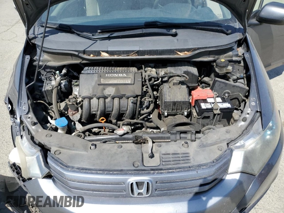 2010 Honda Insight EX with VIN JHMZE2H7XAS021268, listed as a Copart auction lot 54179245 with 211,561 mi miles and Salvage Title. Bid and sale history available at DreamBid. Image 11.