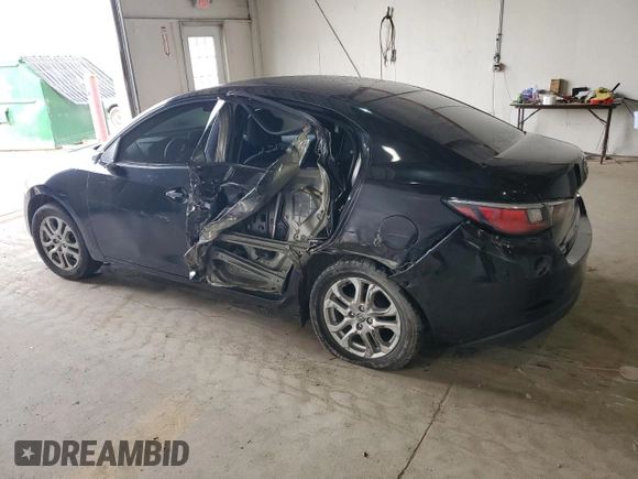 2016 Scion iA z VIN 3MYDLBZV3GY126714, wystawiony jako Copart lot #53955955 z przebiegiem 79 349 mil mil oraz Szkoda całkowita • Salvage title. Historia ofert i sprzedaży dostępna na DreamBid. Obrazek 2.
