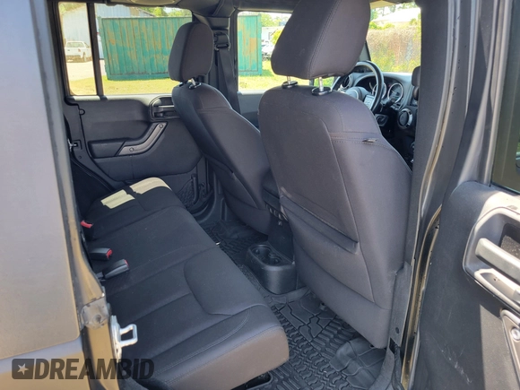 2014 Jeep Wrangler Unlimited Sport with VIN 1C4HJWDG4EL159619, listed as a IAAI auction lot 42176313 with 79,715 mi miles and . Bid and sale history available at DreamBid. Image 11.
