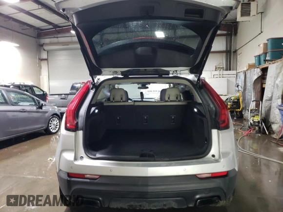 2019 Cadillac XT4 AWD Luxury with VIN 1GYFZBR44KF128401, listed as a Copart auction lot 45926895 with 76,303 mi miles and Salvage Title. Bid and sale history available at carsss.com. Image 6.