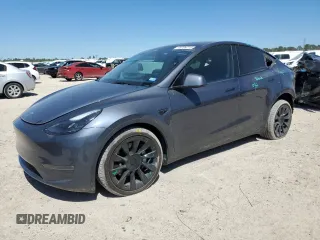 2023 Tesla Model Y Long Range z VIN 7SAYGDEE8PA185193, wystawiony jako Copart lot #48706215 z przebiegiem 10 451 mil mil oraz Szkoda całkowita • Salvage title. Historia ofert i sprzedaży dostępna na DreamBid. Obrazek 1.