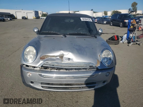 2005 MINI Convertible with VIN WMWRF33465TG10044, listed as a Copart auction lot 50364235 with 152,186 mi miles and Salvage title. Bid and sale history available at DreamBid. Image 5.