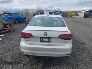 2016 Volkswagen Jetta Sport z VIN 3VWD17AJ3GM216976, wystawiony jako IAAI lot #42012643 z przebiegiem 145 795 mil mil oraz . Historia ofert i sprzedaży dostępna na DreamBid. Obrazek 16.