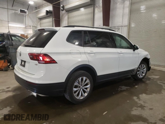 2018 Volkswagen Tiguan S with VIN 3VV1B7AX4JM118670, listed as a Copart auction lot 57055935 with 104,443 mi miles and Salvage title. Bid and sale history available at DreamBid. Image 3.
