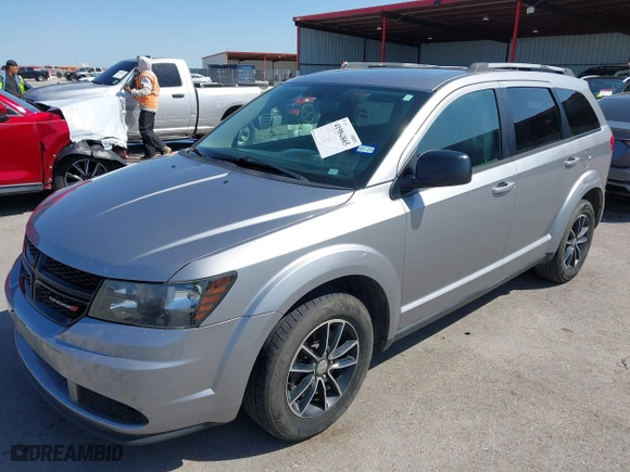 2017 Dodge Journey SE with VIN 3C4PDCAB1HT573511, listed as a IAAI auction lot 41984865 with 128,721 mi miles. Bid and sale history available at carsss.com. Image 19.