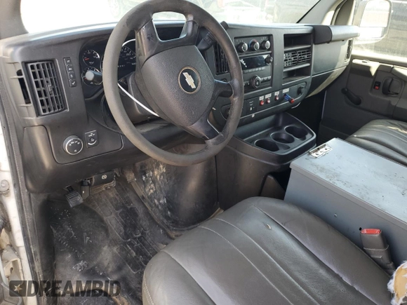 2013 Chevrolet Express Cargo z VIN 1GCWGFCA7D1903209, wystawiony jako Copart lot #60003795 z przebiegiem 175 440 mil mil oraz Czysty tytuł • Clean title. Historia ofert i sprzedaży dostępna na DreamBid. Obrazek 8.
