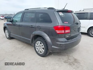 2017 Dodge Journey SE with VIN 3C4PDCABXHT694909, listed as a IAAI auction lot 41640828 with 188,657 mi miles and . Bid and sale history available at DreamBid. Image 3.