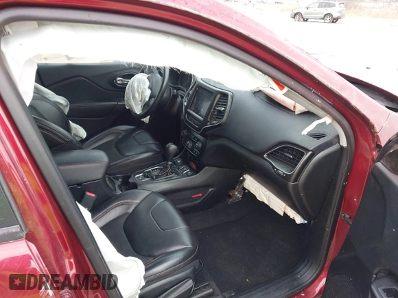2019 Jeep Cherokee Trailhawk with VIN 1C4PJMBX1KD314149, listed as a IAAI auction lot 40929910 with 77,000 mi miles and . Bid and sale history available at DreamBid. Image 5.