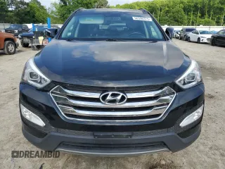 2014 Hyundai Santa Fe with VIN 5XYZUDLBXEG198796, listed as a Copart auction lot 56596375 with 106,017 mi miles and Salvage title. Bid and sale history available at DreamBid. Image 5.