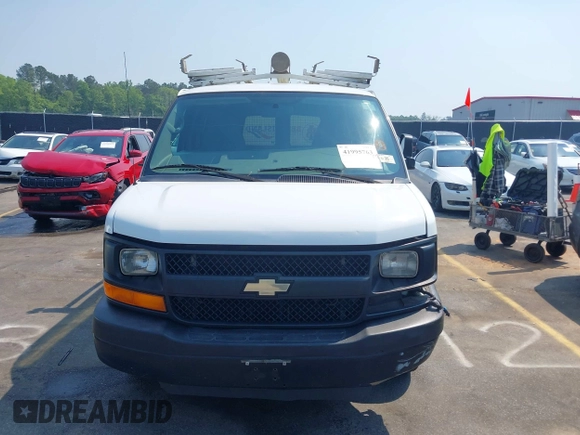 2015 Chevrolet Express Cargo Van with VIN 1GCWGFCF8F1255703, listed as a IAAI auction lot 41995763 with 215,212 mi miles. Bid and sale history available at carsss.com. Image 12.