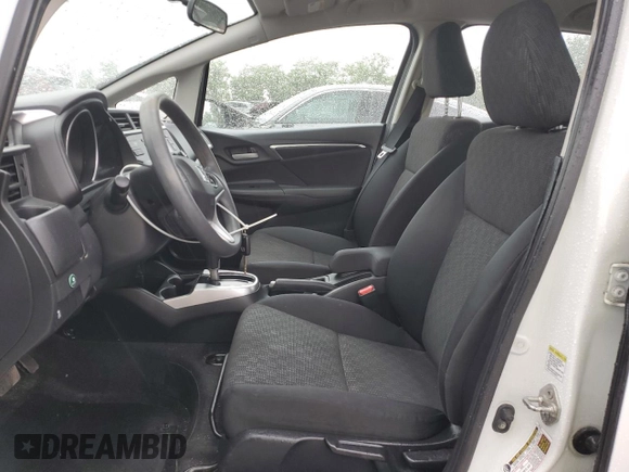 2015 Honda Fit LX with VIN 3HGGK5H57FM722000, listed as a Copart auction lot 57331455 with 140,546 mi miles and Salvage title. Bid and sale history available at DreamBid. Image 7.