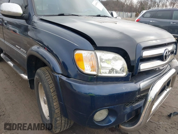 2003 Toyota Tundra SR5 with VIN 5TBBT44143S388838, listed as a IAAI auction lot 41498748 with 180,937 mi miles and . Bid and sale history available at carsss.com. Image 12.
