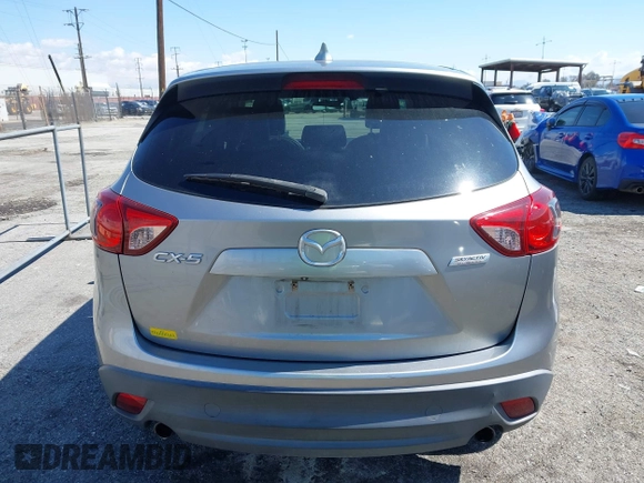 2014 Mazda CX-5 Grand Touring with VIN JM3KE2DY0E0331942, listed as a IAAI auction lot 41750533 with 163,387 mi miles. Bid and sale history available at carsss.com. Image 16.