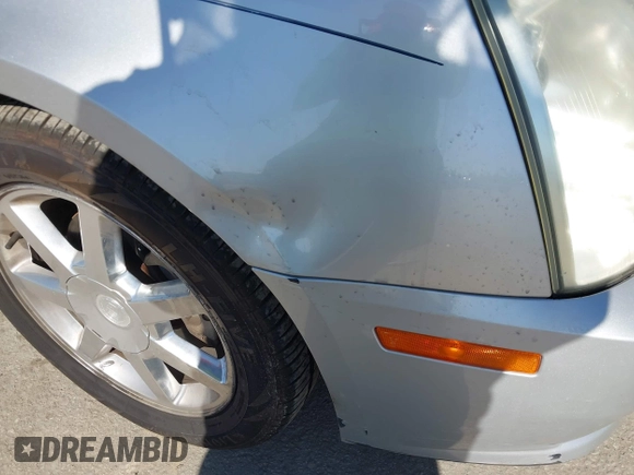 2005 Cadillac STS z VIN 1G6DW677350224198, wystawiony jako IAAI lot #42321639 z przebiegiem 122 208 mil mil oraz . Historia ofert i sprzedaży dostępna na DreamBid. Obrazek 18.