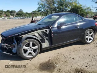 2015 Mercedes-Benz SLK-Class SLK 250 with VIN WDDPK4HA9FF096428, listed as a Copart auction lot 74772284 with 74,938 mi miles and Salvage Title. Bid and sale history available at carsss.com. Image 1.