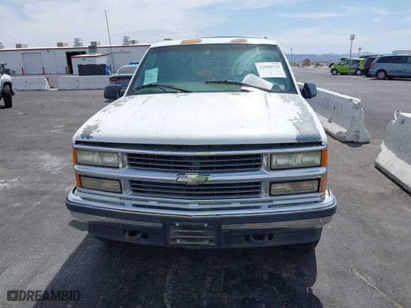 1997 Chevrolet Tahoe with VIN 1GNEK13R6VJ443195, listed as a IAAI auction lot 42000733 with 202,106 mi miles. Bid and sale history available at carsss.com. Image 6.