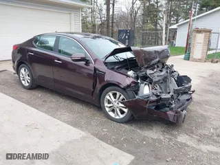 2013 Kia Optima EX with VIN 5XXGN4A79DG240428, listed as a IAAI auction lot 42017665 with 94,765 mi miles. Bid and sale history available at carsss.com. Image 1.