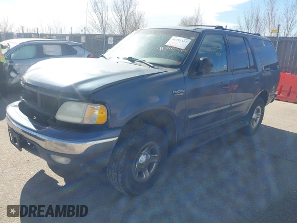1999 Ford Expedition XLT z VIN 1FMPU18L2XLB43236, wystawiony jako IAAI lot #41792317 z przebiegiem 157 636 mil mil oraz . Historia ofert i sprzedaży dostępna na DreamBid. Obrazek 18.
