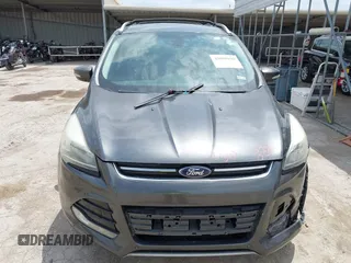 2015 Ford Escape Titanium z VIN 1FMCU0JX3FUA71770, wystawiony jako IAAI lot #42085635 z przebiegiem 141 890 mil mil oraz . Historia ofert i sprzedaży dostępna na DreamBid. Obrazek 12.