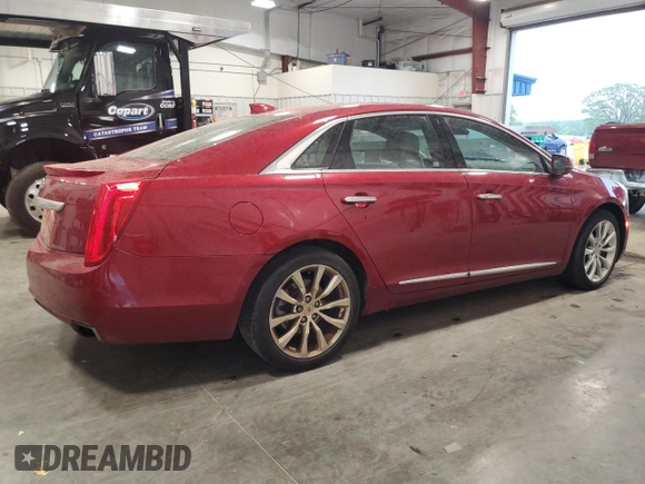 2015 Cadillac XTS Luxury z VIN 2G61M5S39F9189133, wystawiony jako Copart lot #56889185 z przebiegiem 130 927 mil mil oraz Czysty tytuł • Clean title. Historia ofert i sprzedaży dostępna na DreamBid. Obrazek 3.