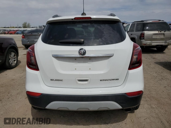 2018 Buick Encore Preferred with VIN KL4CJASB2JB592788, listed as a Copart auction lot 50363145 with 112,630 mi miles and Salvage Title. Bid and sale history available at DreamBid. Image 6.