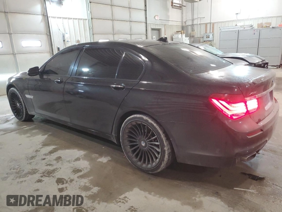 2013 BMW 7 Series 740Li xDrive with VIN WBAYF4C50DD127620, listed as a Copart auction lot 75655904 with 138,033 mi miles and Salvage title. Bid and sale history available at DreamBid. Image 2.