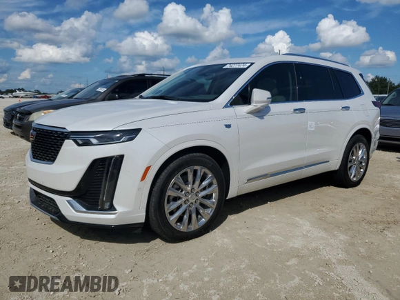 2022 Cadillac XT6 Premium Luxury with VIN 1GYKPCRS0NZ182810, listed as a Copart auction lot 74277474 with 0 mi miles and Salvage Title. Bid and sale history available at carsss.com. Image 1.