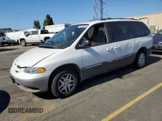 1998 Dodge Caravan LE with VIN 1B4GP54LXWB688630, listed as a Copart auction lot 74829544 with 209,157 mi miles and Salvage Title. Bid and sale history available at carsss.com. Image 1.