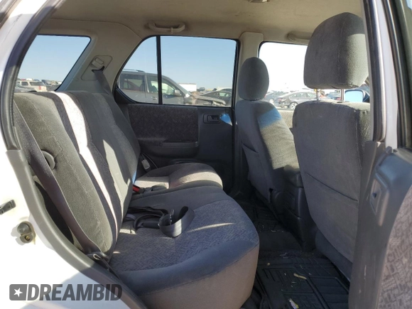 2001 Isuzu Rodeo S z VIN 4S2DM58W114306215, wystawiony jako Copart lot #85287914 z przebiegiem 157 844 mil mil oraz Szkoda całkowita • Salvage title. Historia ofert i sprzedaży dostępna na DreamBid. Obrazek 11.