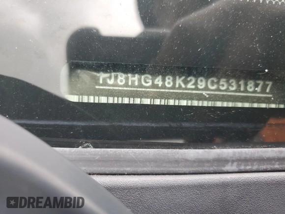 2009 Jeep Commander Sport z VIN 1J8HG48K29C531877, wystawiony jako Copart lot #58708825 z przebiegiem 198 585 mil mil oraz Szkoda całkowita • Salvage title. Historia ofert i sprzedaży dostępna na DreamBid. Obrazek 14.