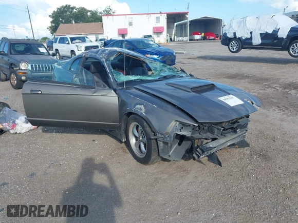 2004 Ford Mustang Standard z VIN 1FAFP40684F194867, wystawiony jako IAAI lot #39963442 z przebiegiem Nie podano mil oraz . Historia ofert i sprzedaży dostępna na DreamBid. Obrazek 1.